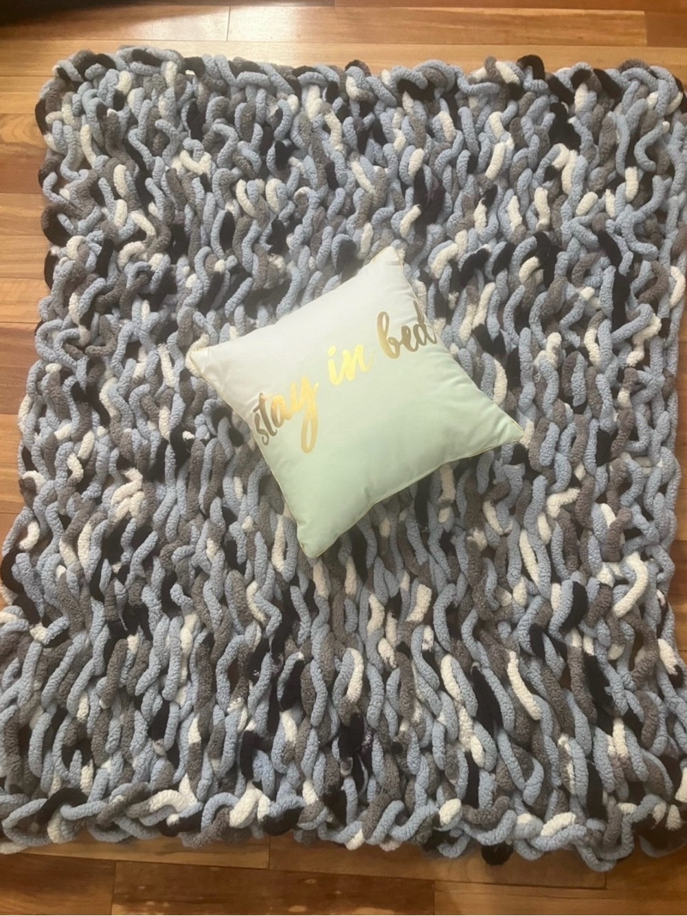Knitted grey ombré blanket